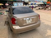 Cần bán lại xe Daewoo Lacetti sản xuất 2005, nhập khẩu nguyên chiếc, màu nâu vàng