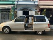 Xe Kia Carnival đời 2008, màu vàng, nhập khẩu 