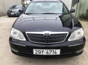 Bán Toyota Camry sản xuất 2006, màu đen còn mới