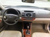 Bán Toyota Camry sản xuất 2006, màu đen còn mới