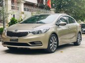 Cần bán gấp Kia K3 1.6 đời 2015, màu vàng