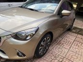 Cần bán lại xe Mazda 2 đời 2017, màu vàng chính chủ