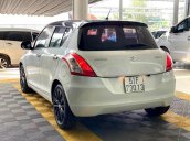 Cần bán xe Suzuki Swift 1.4AT 2016, màu trắng