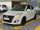 Cần bán xe Suzuki Swift 1.4AT 2016, màu trắng