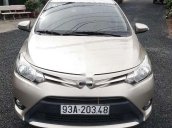 Bán xe Toyota Vios 2015, màu ghi vàng, số sàn giá cạnh tranh