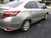 Bán xe Toyota Vios 2015, màu ghi vàng, số sàn giá cạnh tranh