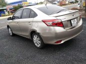 Bán xe Toyota Vios 2015, màu ghi vàng, số sàn giá cạnh tranh