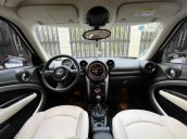 Bán Mini Cooper Coutryman 2014 màu trắng, nội thất kem, xe đẹp đi đúng 33.000km bao kiểm tra hãng