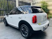 Bán Mini Cooper Coutryman 2014 màu trắng, nội thất kem, xe đẹp đi đúng 33.000km bao kiểm tra hãng