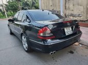 Bán Mercedes E320 đời 2002, màu đen chính chủ