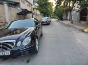 Bán Mercedes E320 đời 2002, màu đen chính chủ