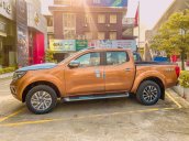 Nissan Navara màu cam VL 4WD AT giá xả kho