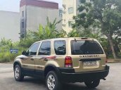 Bán ô tô Ford Escape năm 2002, màu vàng còn mới, giá 125tr