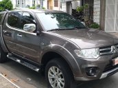 Bán Mitsubishi Triton GLS nhập khẩu 2 cầu máy dầu 2.5, số tự động, đời T12/2014, màu nâu tuyệt đẹp mới 80%