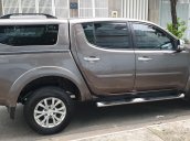 Bán Mitsubishi Triton GLS nhập khẩu 2 cầu máy dầu 2.5, số tự động, đời T12/2014, màu nâu tuyệt đẹp mới 80%