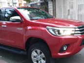 Bán Toyota Hilux G 2 cầu máy dầu 2.8 số tự động, model 2017, sx T12/2016, màu đỏ tuyệt đẹp mới 80%