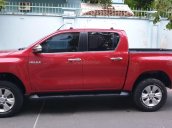 Bán Toyota Hilux G 2 cầu máy dầu 2.8 số tự động, model 2017, sx T12/2016, màu đỏ tuyệt đẹp mới 80%