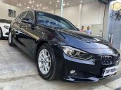 Cần bán lại xe BMW 320i năm 2013, màu đen, nhập khẩu nguyên chiếc còn mới, giá chỉ 720 triệu