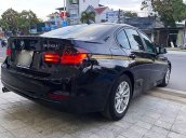 Cần bán lại xe BMW 320i năm 2013, màu đen, nhập khẩu nguyên chiếc còn mới, giá chỉ 720 triệu