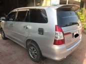 Cần bán lại xe Toyota Innova sản xuất 2014, màu bạc