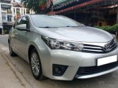 Bán Toyota Corolla Altis năm 2015, màu bạc còn mới, 565 triệu