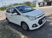 Bán ô tô Hyundai Grand i10 đời 2015, màu trắng, nhập khẩu số sàn