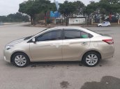 Bán Toyota Vios 2015, màu vàng còn mới, giá tốt