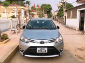 Cần bán Toyota Vios đời 2015, màu bạc số sàn