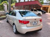 Cần bán gấp Kia Forte năm sản xuất 2011, màu vàng cát