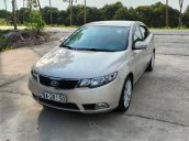 Cần bán gấp Kia Forte năm sản xuất 2011, màu vàng cát