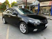 Bán ô tô Kia Cerato 1.6 AT sản xuất 2009, màu đen, nhập khẩu nguyên chiếc còn mới, 306 triệu