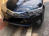 Cần bán lại xe Toyota Corolla Altis 1.8AT sản xuất năm 2016, màu đen số tự động