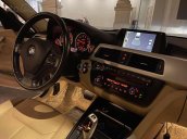 Bán nhanh giá thấp chiếc BMW 320i trắng nội thất kem model 2015