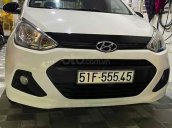 Cần bán Hyundai Grand i10 1.0 MT Base đời 2015, màu trắng, xe nhập xe gia đình