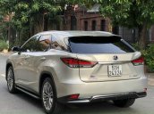 Bán Lexus RX450h sx 2019 đăng ký 2020, xe đi 19.000km màu vàng cát, bao check hãng