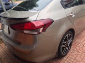 Cần bán Kia Cerato 1.6 MT sản xuất 2016, màu xám  