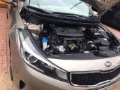 Cần bán Kia Cerato 1.6 MT sản xuất 2016, màu xám  