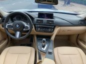 Cần bán gấp BMW 320i đời 2016, màu trắng