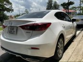 Cần bán gấp Mazda 3 1.5 AT sản xuất 2015, màu trắng xe gia đình, giá 483tr