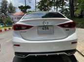 Cần bán gấp Mazda 3 1.5 AT sản xuất 2015, màu trắng xe gia đình, giá 483tr