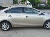 Cần bán gấp Toyota Vios đời 2014, màu ghi vàng