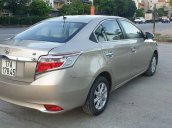 Cần bán gấp Toyota Vios đời 2014, màu ghi vàng