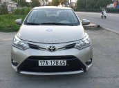 Cần bán gấp Toyota Vios đời 2014, màu ghi vàng