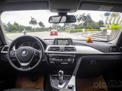 Cần bán BMW 320i đời 2016, màu đen, nhập khẩu nguyên chiếc  