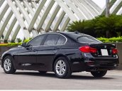 Cần bán BMW 320i đời 2016, màu đen, nhập khẩu nguyên chiếc  