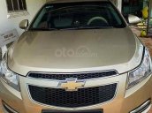 Bán Chevrolet Cruze LS 1.6 MT sản xuất năm 2011, màu vàng cát còn mới