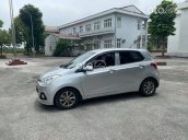 Bán xe Hyundai Grand i10 đời 2014, màu bạc số sàn