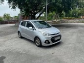 Bán xe Hyundai Grand i10 đời 2014, màu bạc số sàn