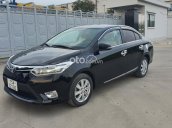 Cần bán Toyota Vios E năm 2014, màu đen số sàn