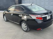 Cần bán Toyota Vios E năm 2014, màu đen số sàn